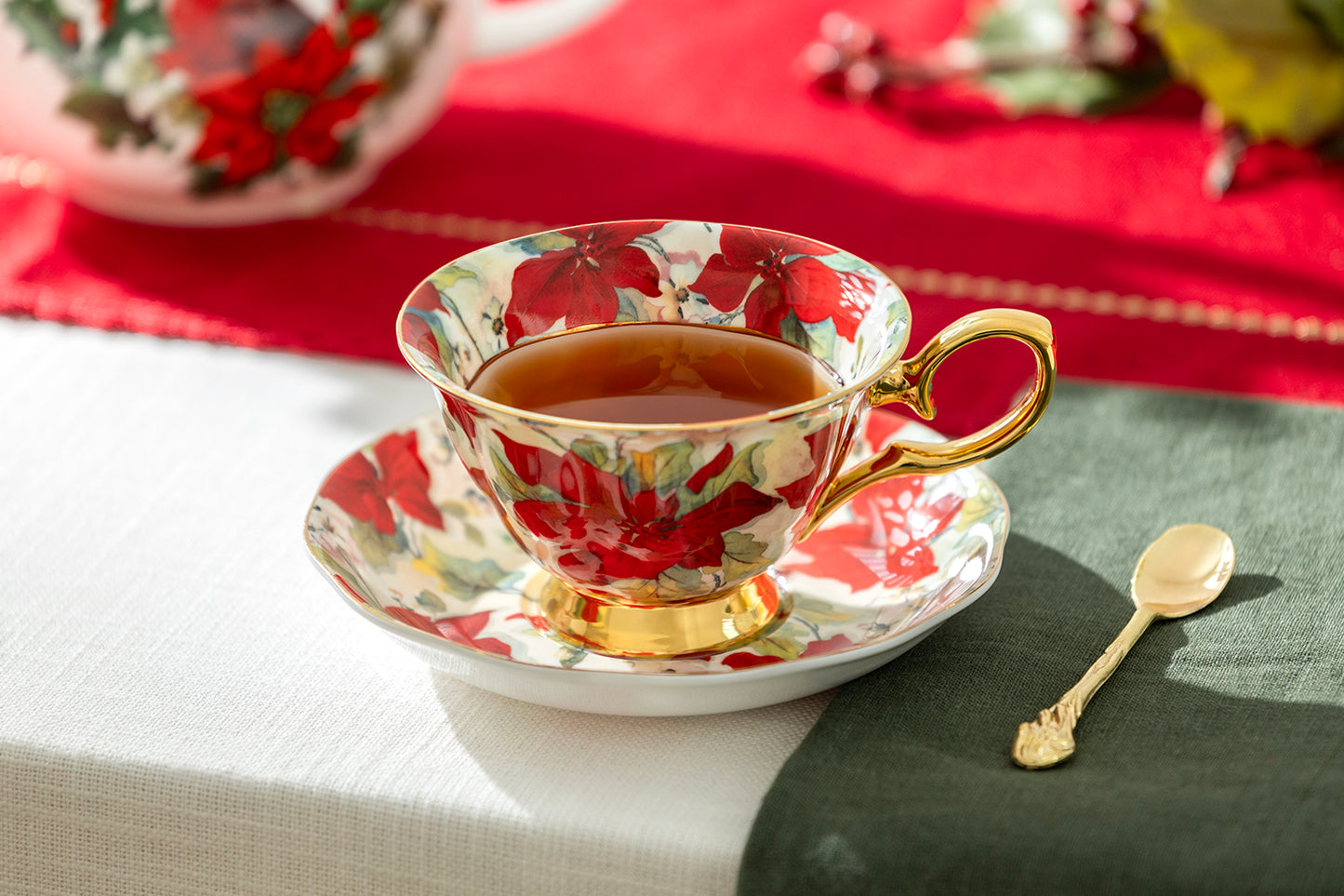 Poinsettia Gold Bone China Tea Cup and Saucer