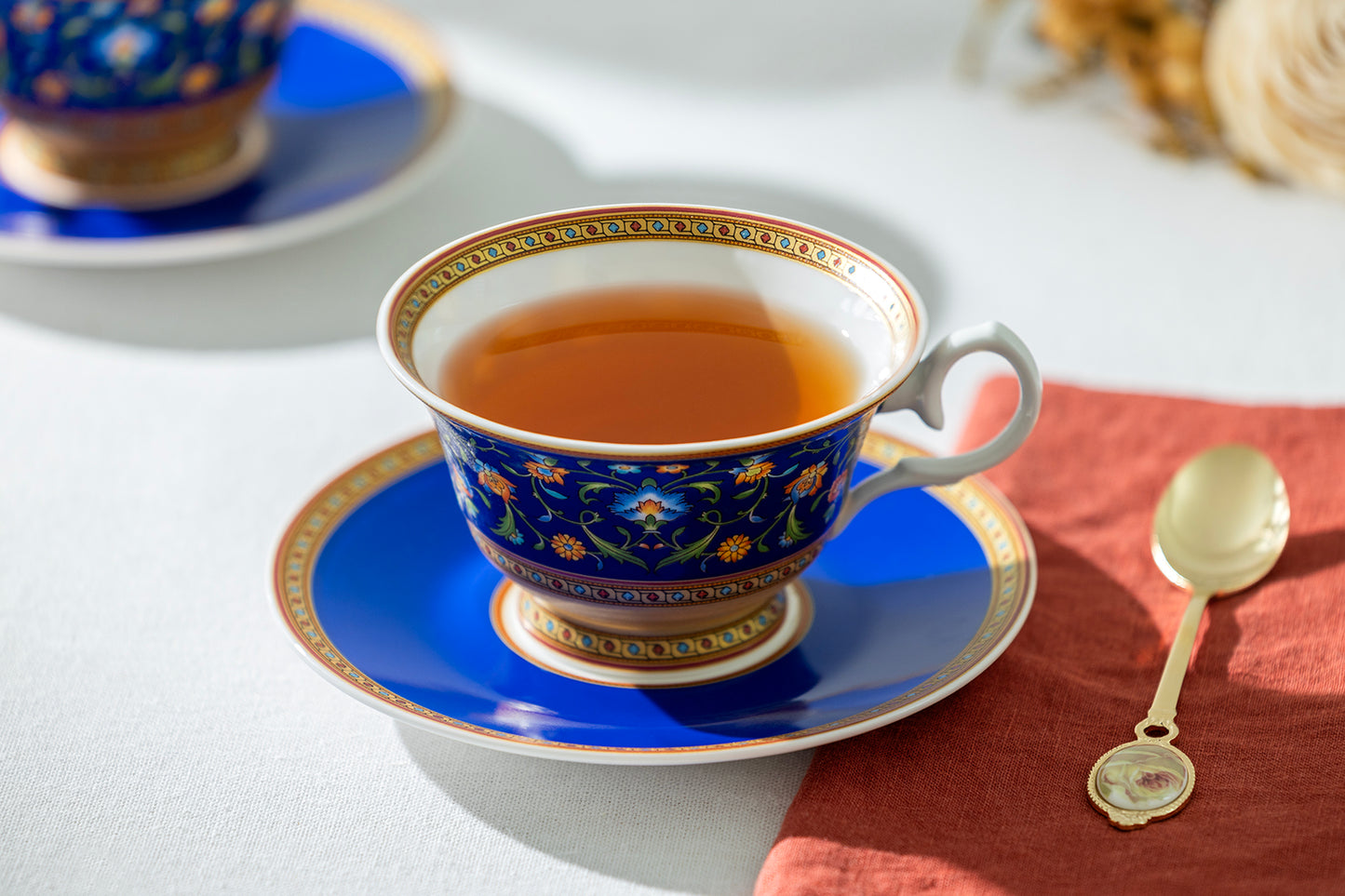 Royal Blue Floral Bone China Tea Cup and Saucer